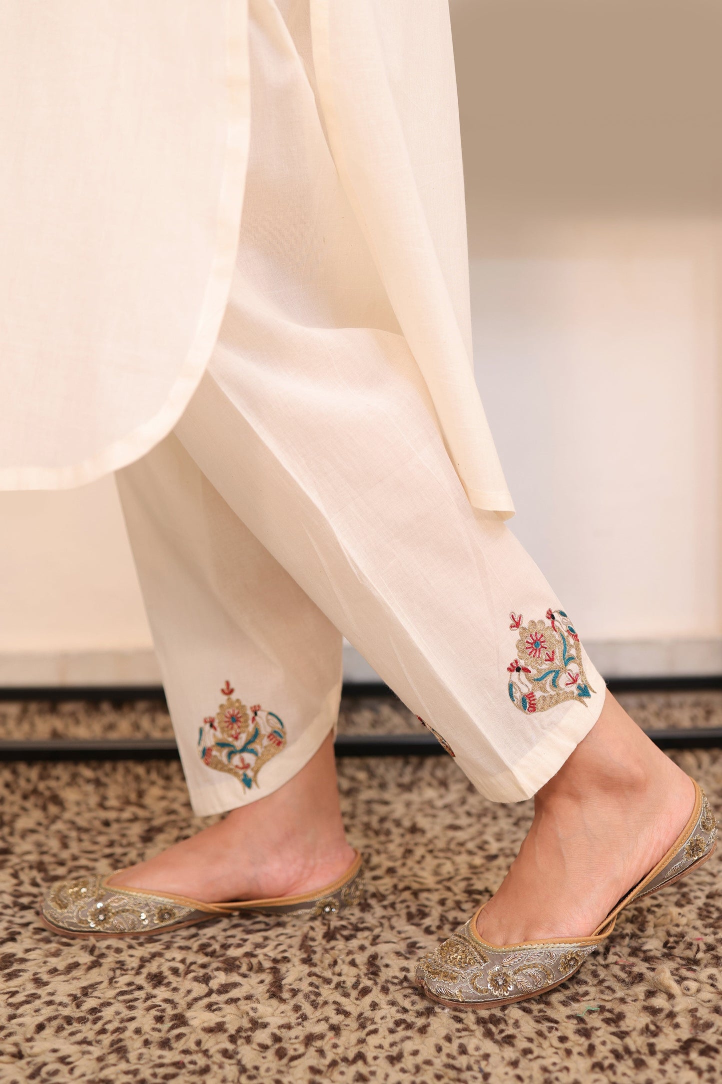 Peacock motif off-white suit