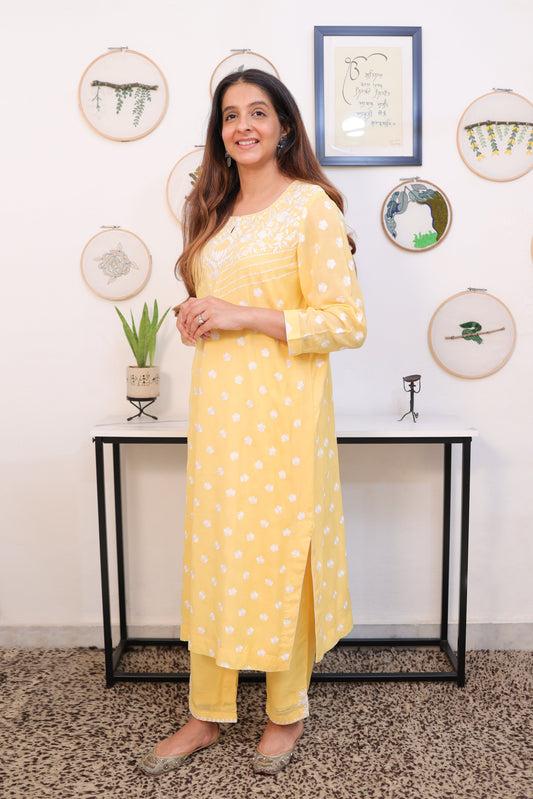 Yellow muslin suit with cream embroidery